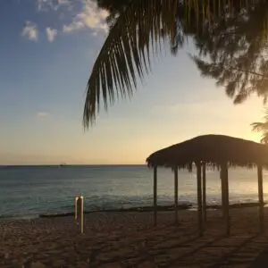 Sunset at the Sea Breeze beach palapa
